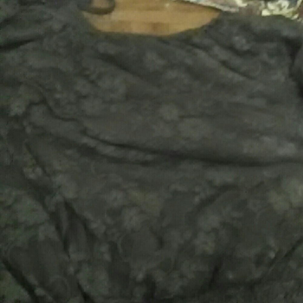 A women's grey lace shirt